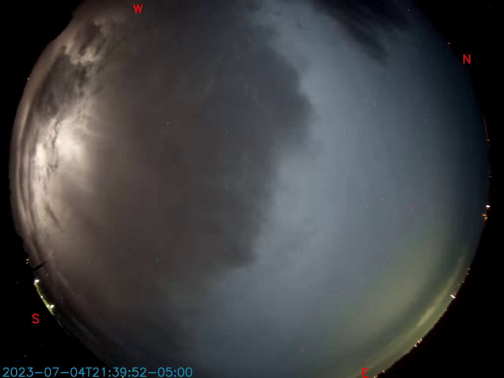 Image from an all-sky camera showing a lightning storm to the southeast.